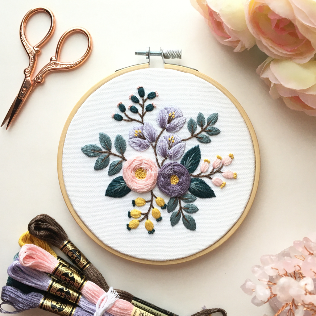 Victorian Bouquet embroidery kit: lavender and pink roses with yellow buds and teal leaves, stitched in a wooden hoop