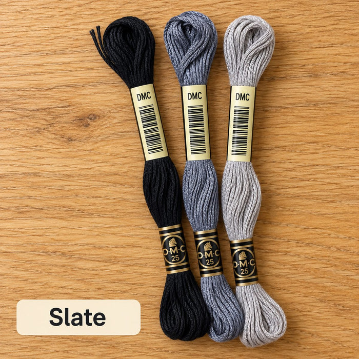 Slate palette: three DMC six-strand embroidery floss skeins